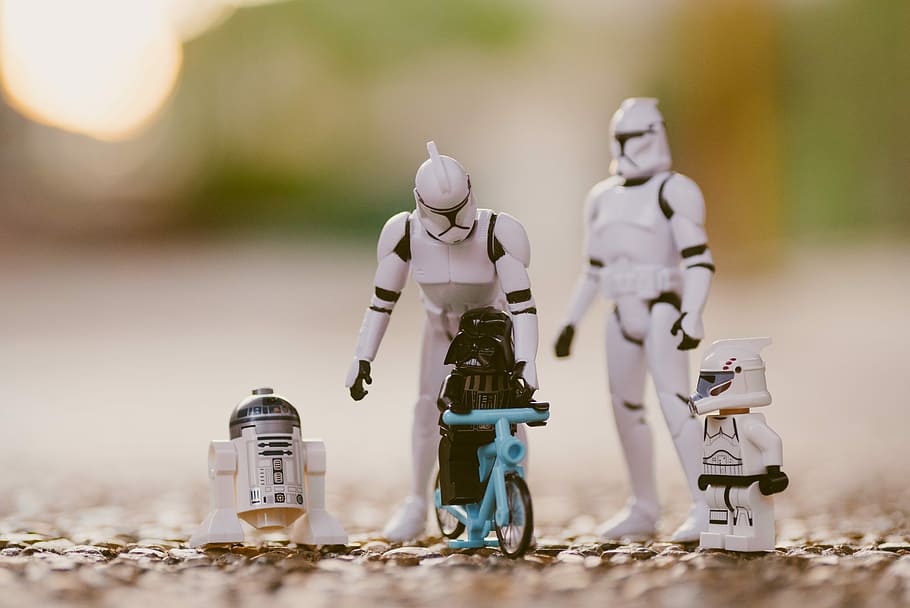 selective focus photography of Star Wars Stormtropper, R2-D2, and Darth Vader toys, shallow focus photography of storm troopers miniatures, HD wallpaper