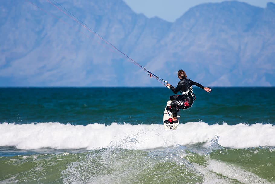 person riding on wakeboard, action, cape town, false bay, kite