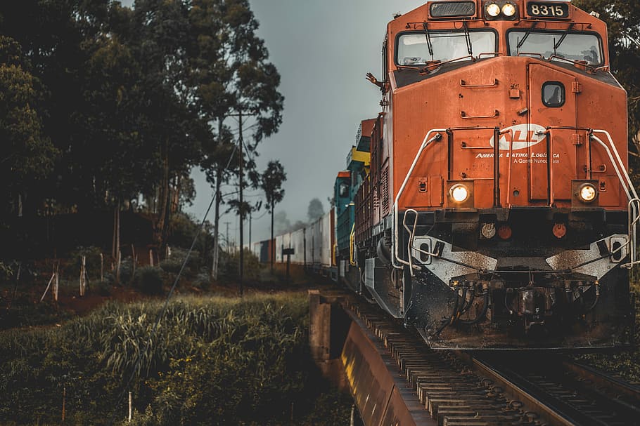 train during golden hour, orange train traveling during sunset HD wallpaper