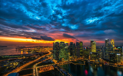 skyscraper during golden hour, high angle photography of lighted buildings HD wallpaper