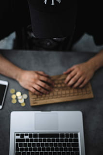 Young man typing on the wooden keyboard, workspace, workplace HD wallpaper