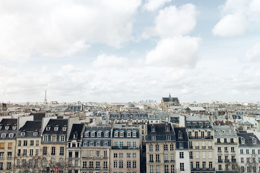 aerial photography of city building s, gray concrete buildings under white sky at daytime HD wallpaper