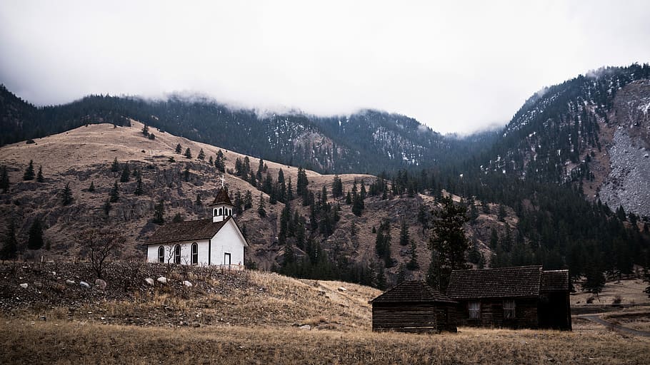 white and brown house on mountain hill, two black and white painted sheds on mountain taken under white clouds during daytime HD wallpaper
