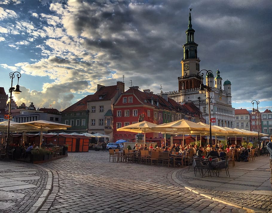 group of people at restaurant, poznan, poland, monuments, city