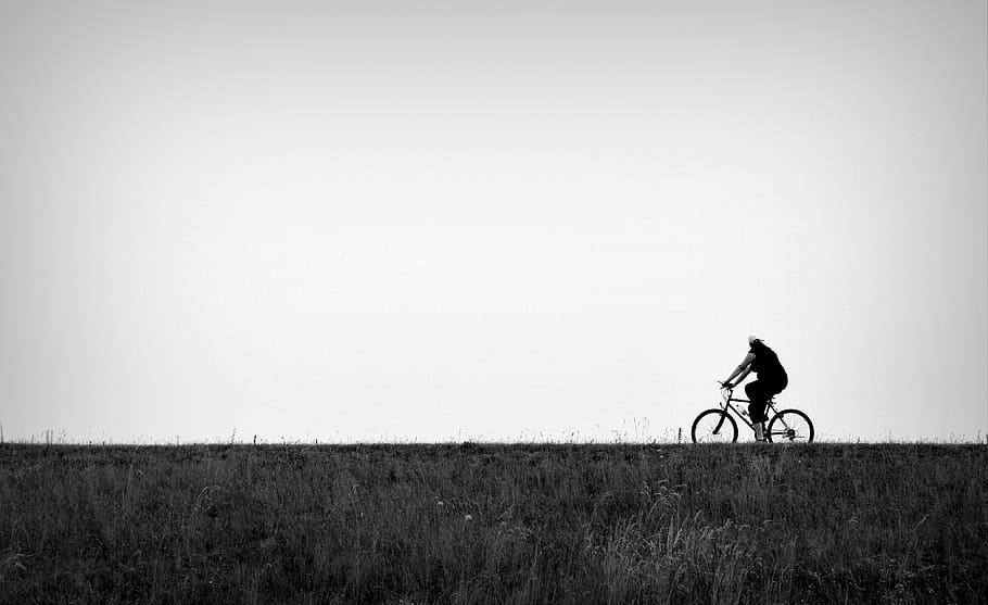 person riding on bicycle at road, round, ride, black and white HD wallpaper