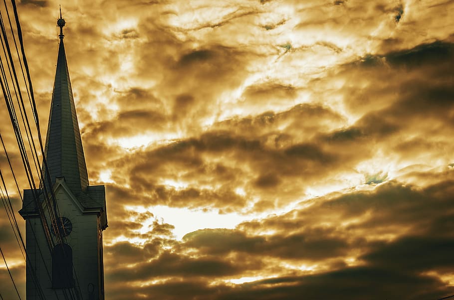 church under orange cloudy sky, silhouette photo of church roof HD wallpaper