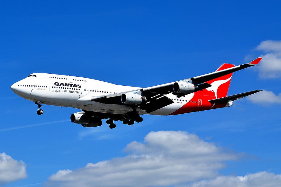 white and red Qantas airplane above skies, aircraft, commercial