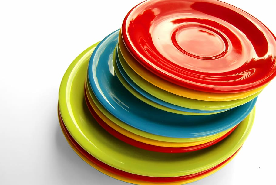 round assorted-color pile of plates, tableware, colorful, stack