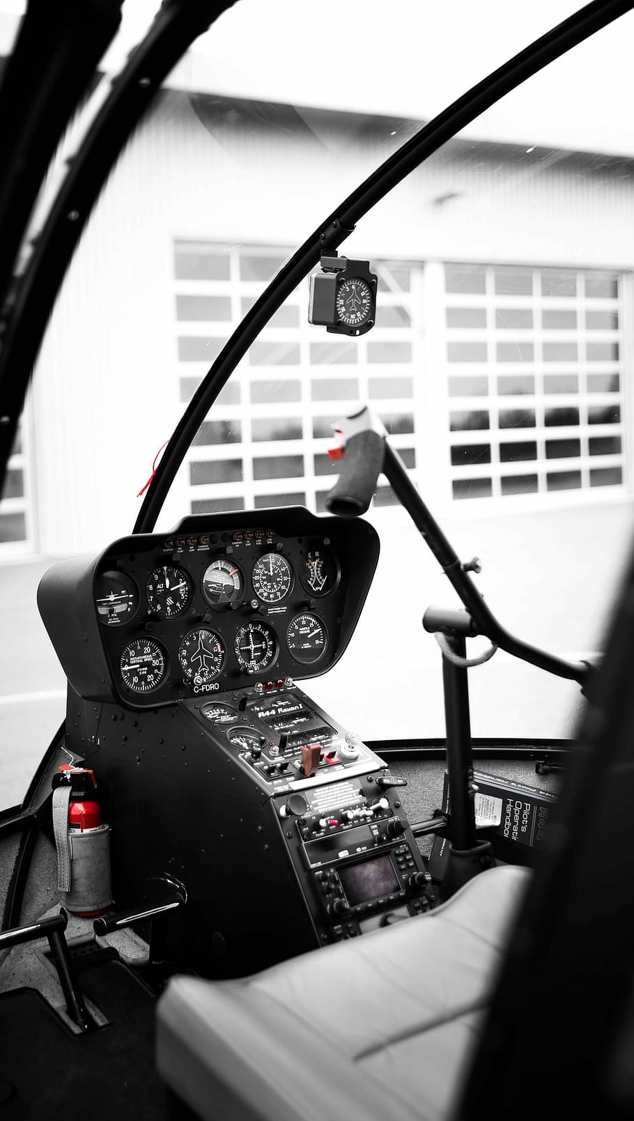 black cockpit helicopter, black and white analog controller, air
