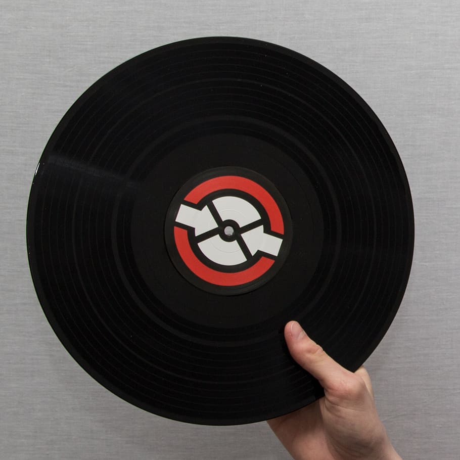 person holding vinyl record disc, lp, dj, music, human hand HD wallpaper
