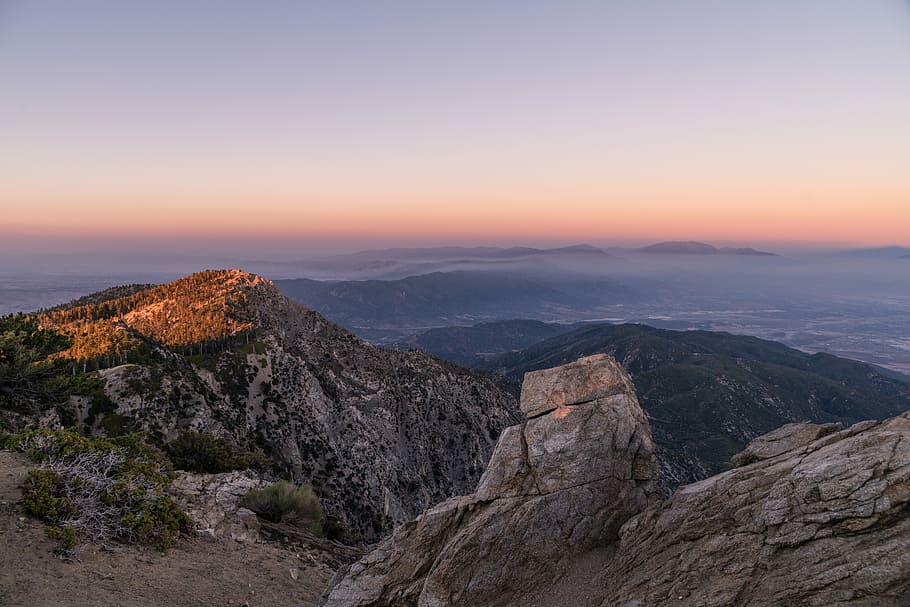mountain rage view under blue sky during day time, rock mountain under blue sky HD wallpaper