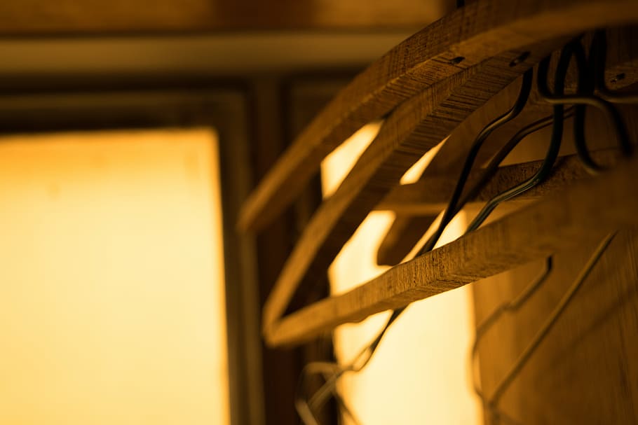 brown hanger near window, closeup, photo, wooden, frame, indoor