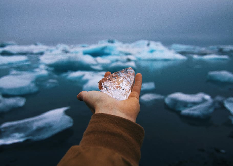 ice in person's palm, person holding clear stone, hand, water, HD wallpaper