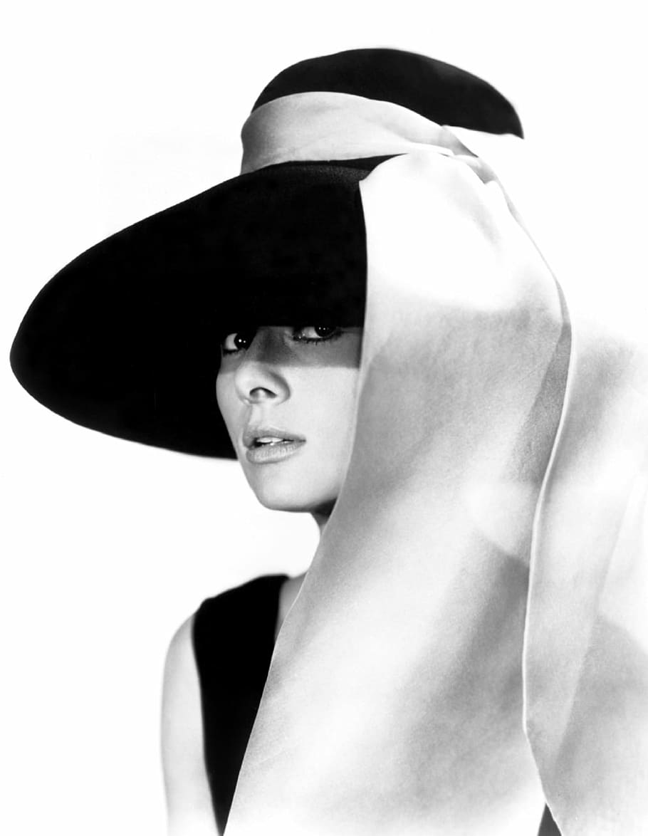 woman in black sleeveless dress and black hat photo, audrey hepburn
