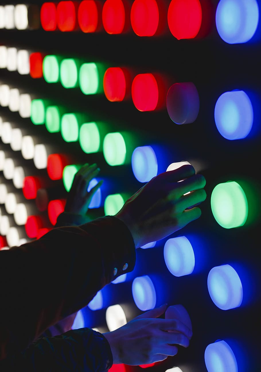 people holding assorted-color LED lights, person holding lighted light HD wallpaper