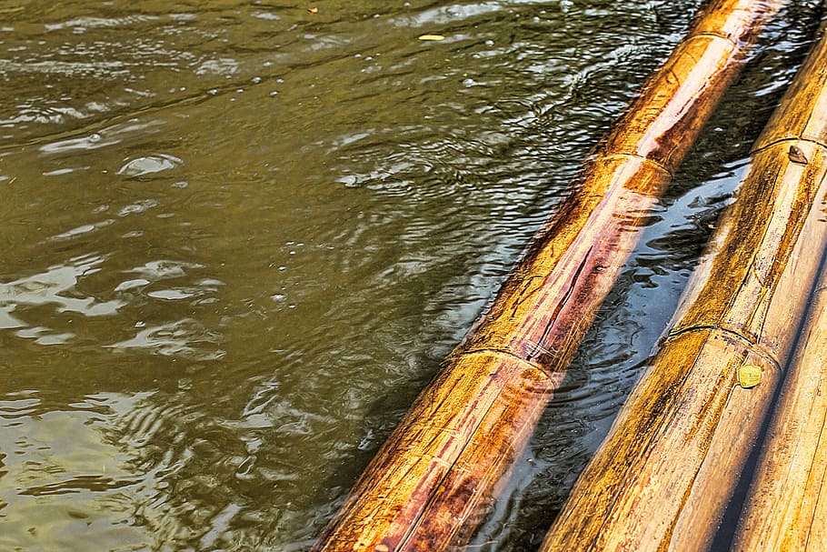 HD wallpaper: three brown bamboo rods floating on body of water, raft ...