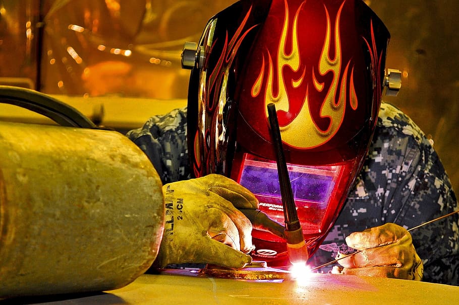 person using welder, construction, welding, industry, worker