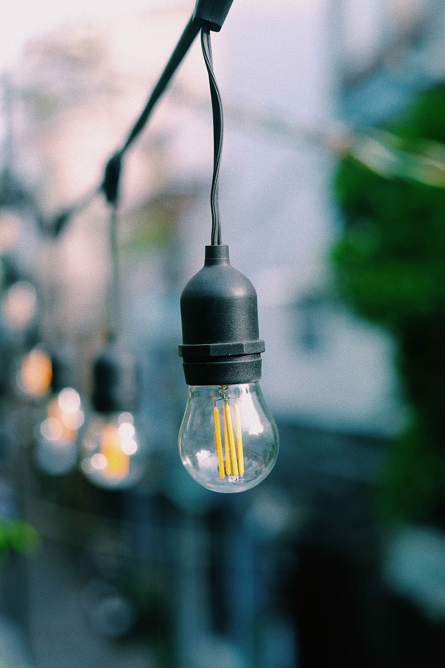 selective focus photography of clear string light, shallow photography of of light bulb HD wallpaper