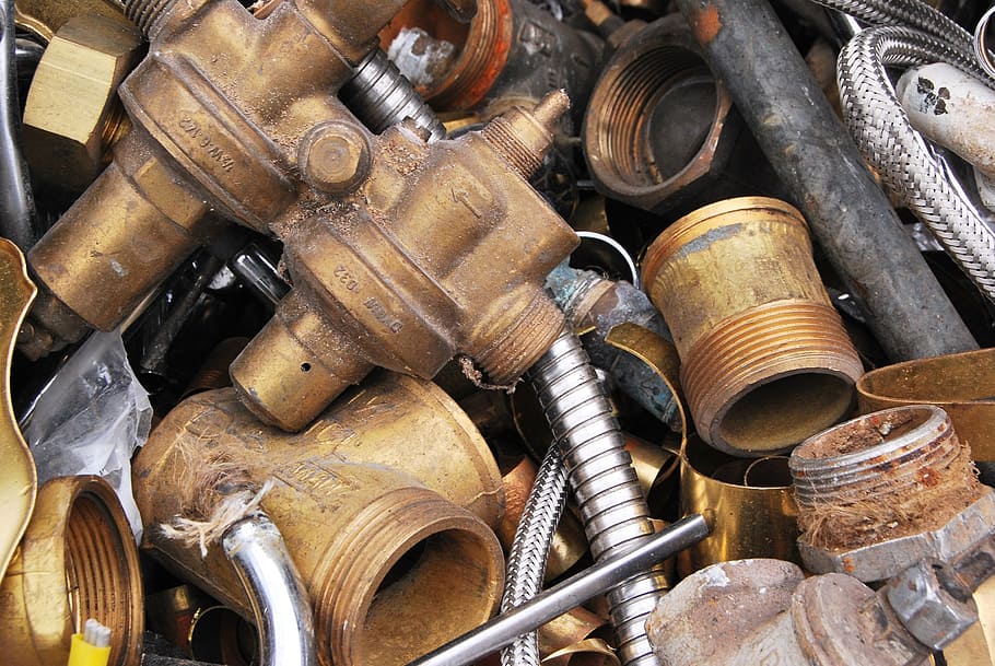 brass-colored pipe connectors lot, scrap, waste, metal, steel