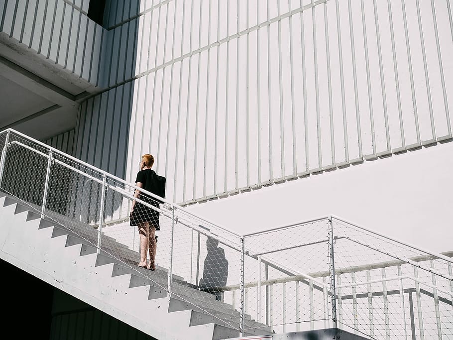 woman standing on stairway during daytime, woman walking on white staircase HD wallpaper
