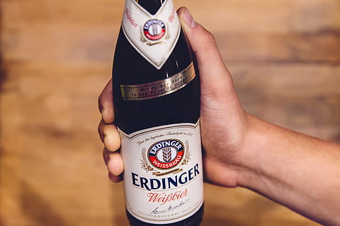 person holding Erdinger wine bottle, Beer, Bottle, Hand, Holding HD wallpaper
