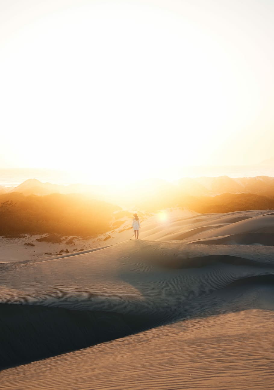 woman in white dress standing on sand photo during sunset, woman standing in the middle of desert HD wallpaper