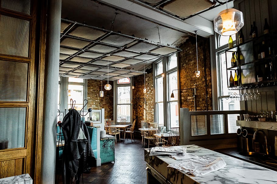 person taking picture inside the restaurant, bar interior, table HD wallpaper