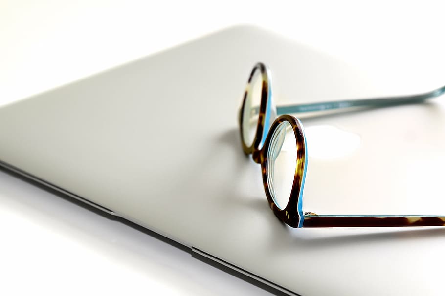 tortoiseshell framed eyeglasses on silver MacBook, laptop, apple HD wallpaper