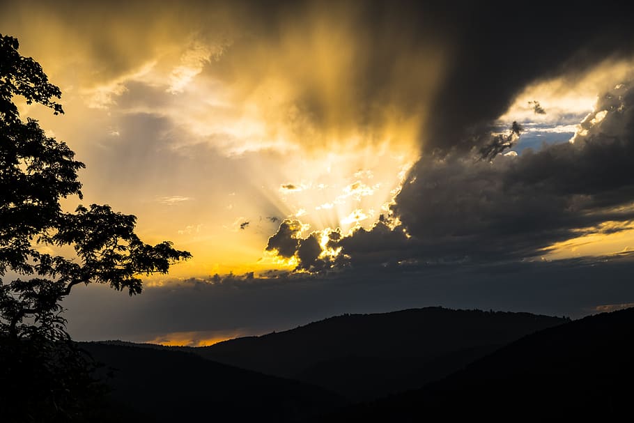 sunset over the horizon, sky, clouds, cloudiness, light, rays HD wallpaper