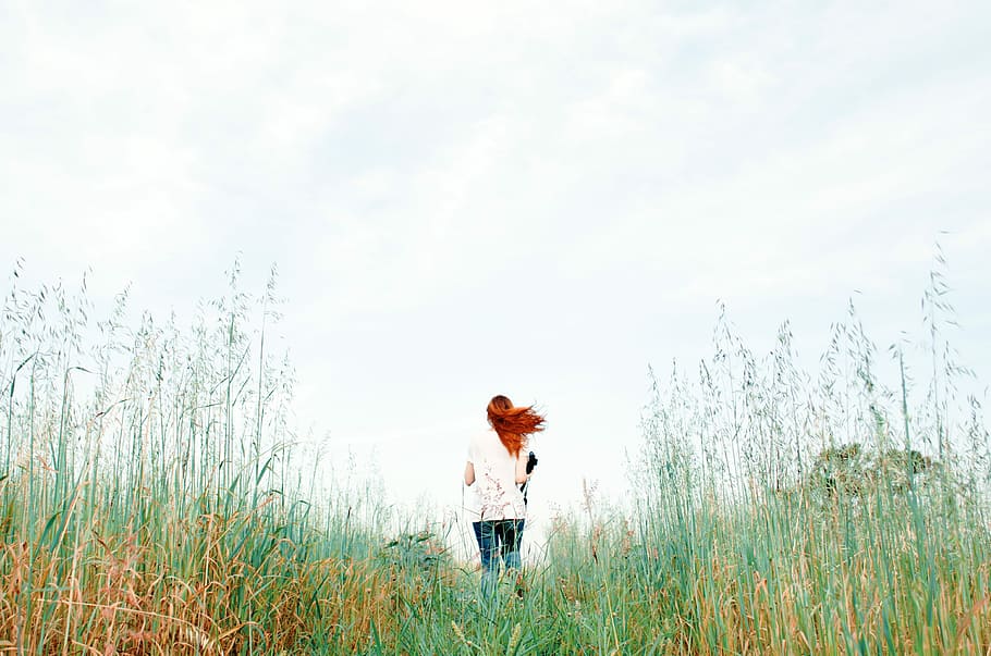 woman standing on green grass field during daytime, outdoors, HD wallpaper
