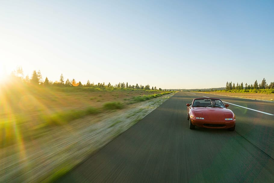 red Mazda Miata convertible on road, car, mx5, small, sports car HD wallpaper