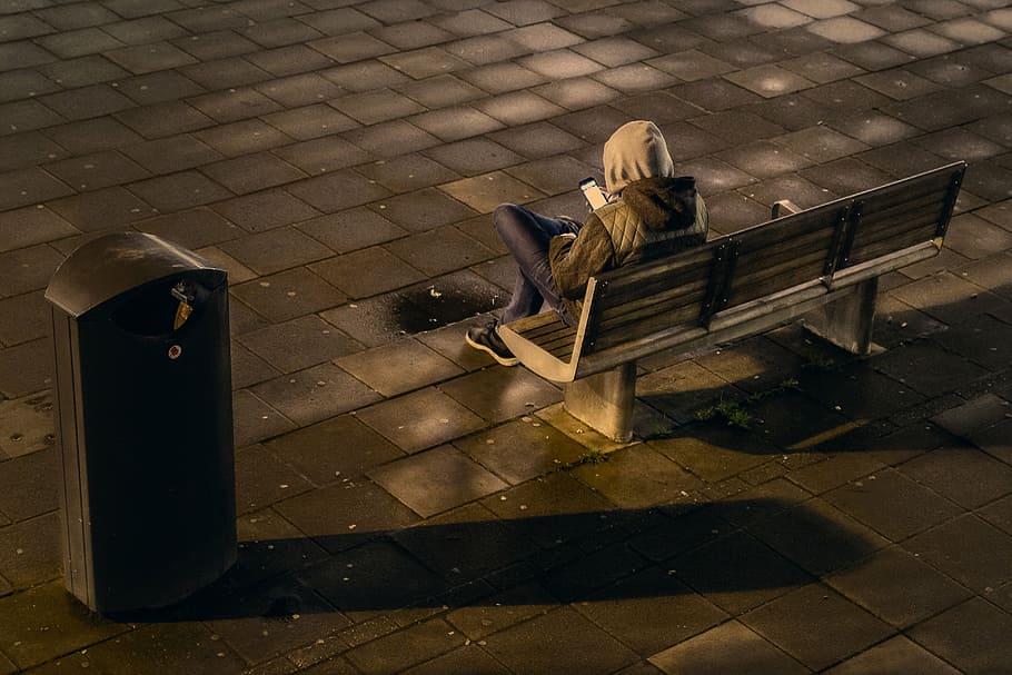 person sitting on bench near box, people, man, alone, sad, chair