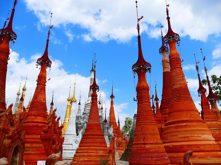 brown temples under blue sky and white clouds during daytime HD wallpaper
