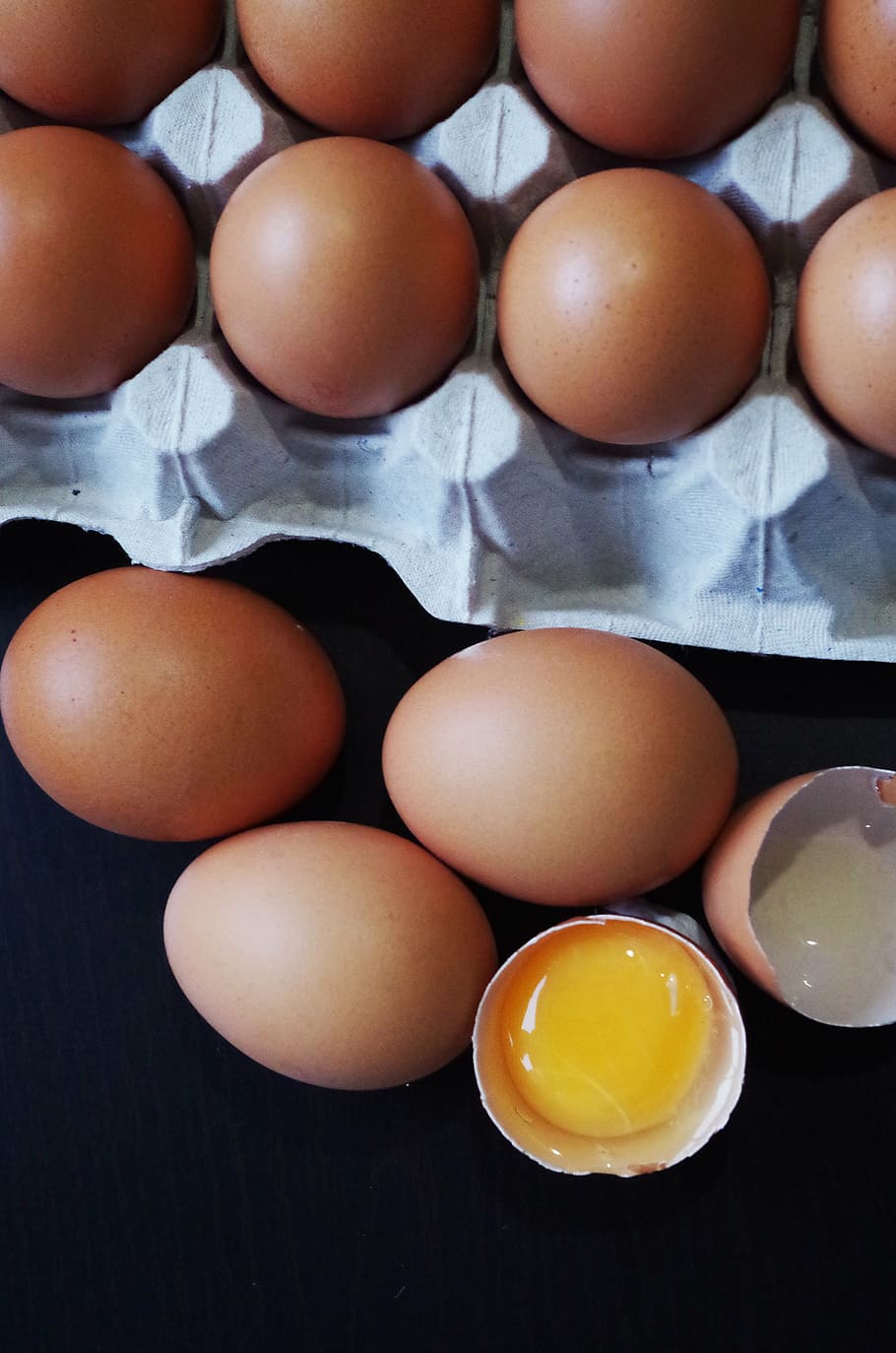 eggs, container, brown, yolk, egg white, broken, food, animal Egg HD wallpaper