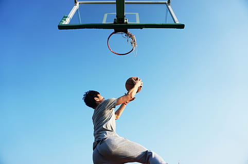man holding ball near basketball hoop, dunk, blue, game, player HD wallpaper
