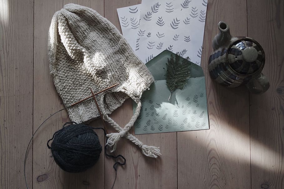 gray knit hat on brown wooden surface, yarn, thread, knitting HD wallpaper