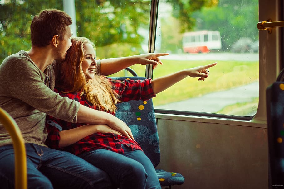 couple sitting near window, trolley bus, two, love, watch, emotions