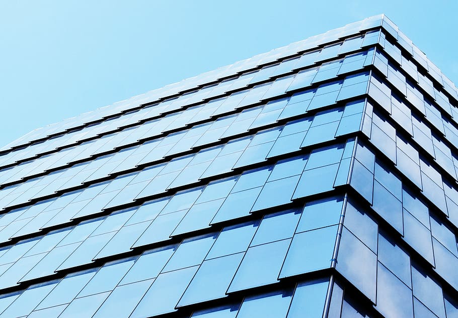 low-angle photography of high-rise building, low angle photography of glass building under blue sky HD wallpaper