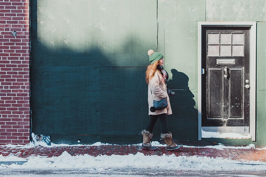 woman walking on sidewalk, snow, winter, white, cold, weather HD wallpaper
