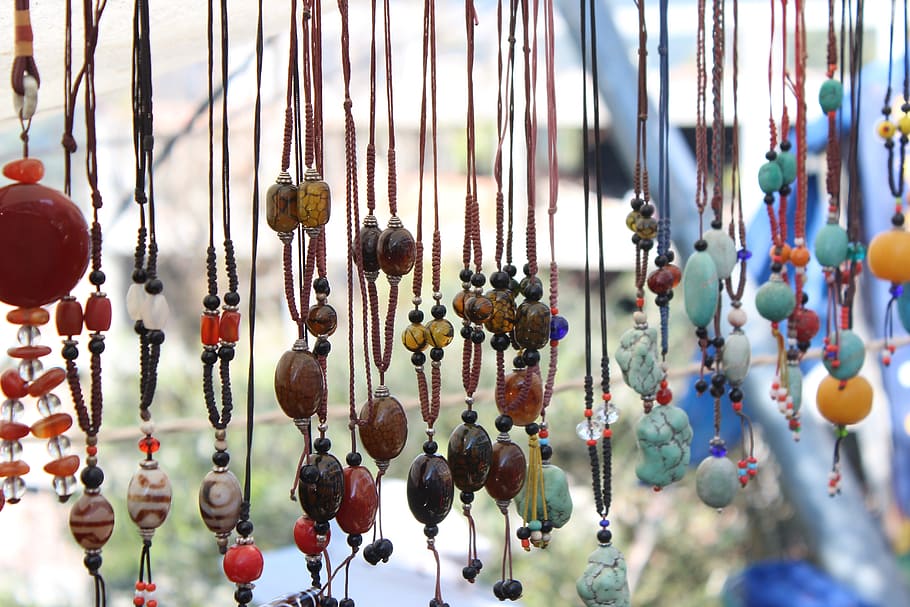 selective focus photograph of assorted-color necklaces, dharamshala, HD wallpaper