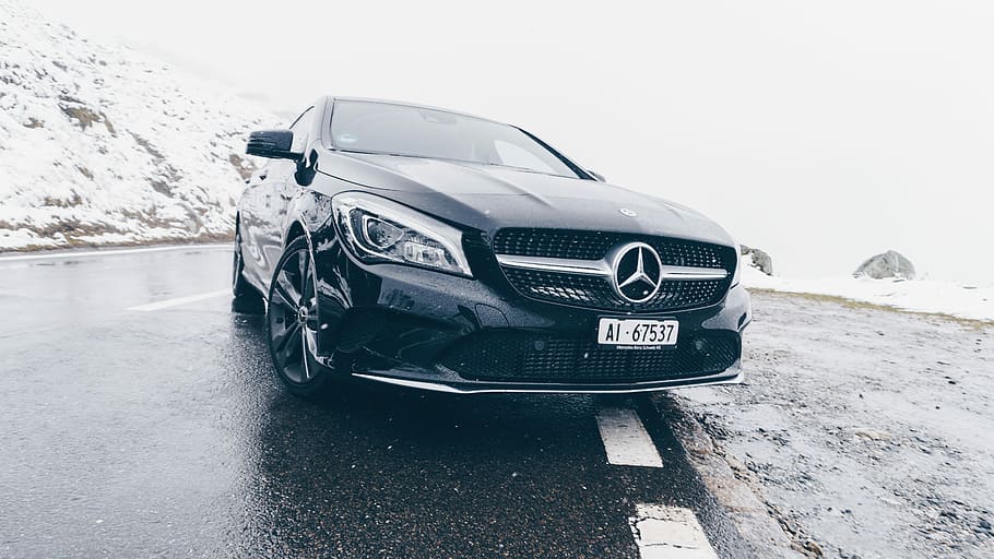 black Mercedes-Benz car on grey concrete surface, black Mercedes-Benz car in snowy area HD wallpaper