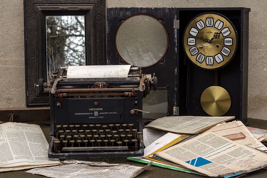 black typewriter near brown labeled papers, still life, mirror HD wallpaper