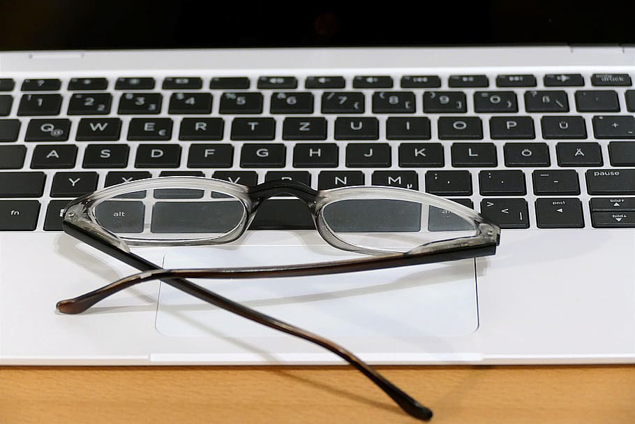 black framed eyeglasses on laptop computer, keyboard, workplace HD wallpaper