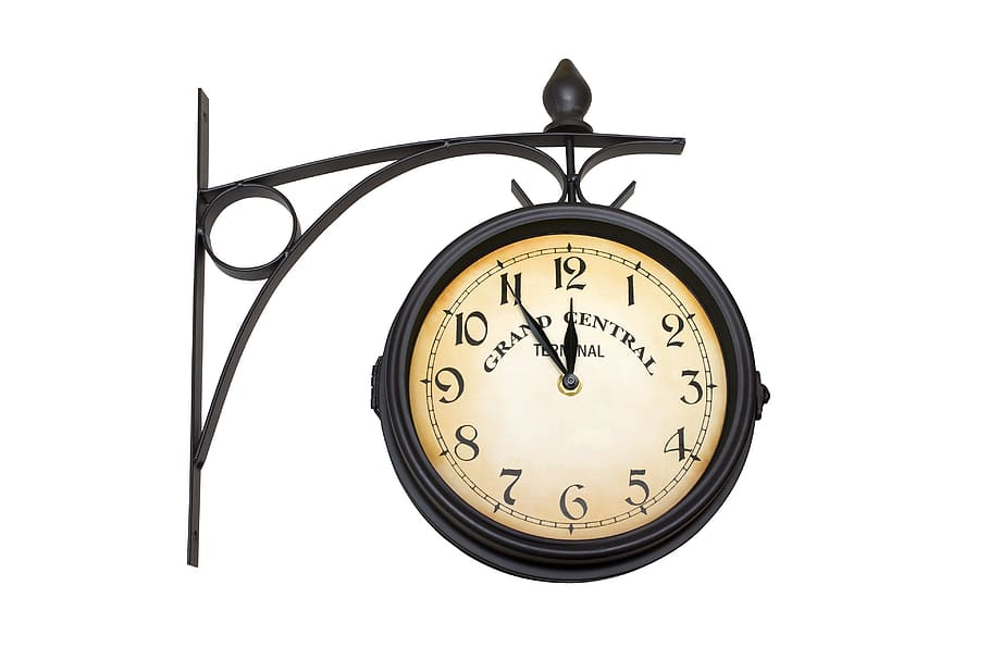 round white and black analog clock reading 11:55 time, station