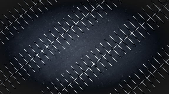 A drone view at night of parking lot lines, black road with white lines HD wallpaper