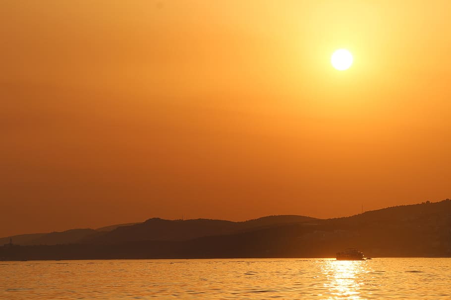 sunset, dawn, waters, sky, beauty in nature, mountain, silhouette HD wallpaper