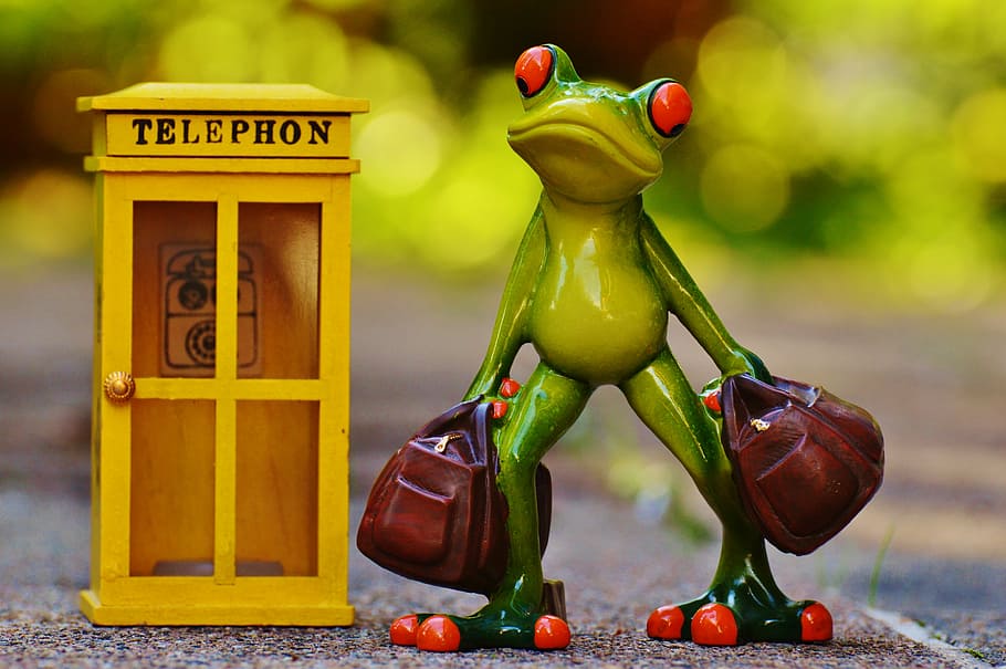 green ceramic frag standing beside telephone booth figurine, frog, HD wallpaper