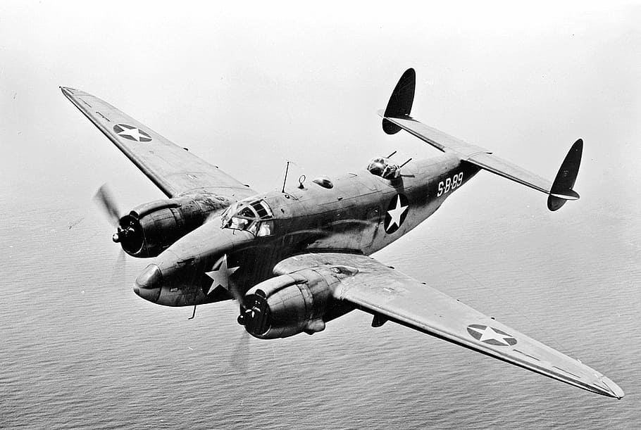 grayscale photography of SB-83 aircraft above large body of water HD wallpaper