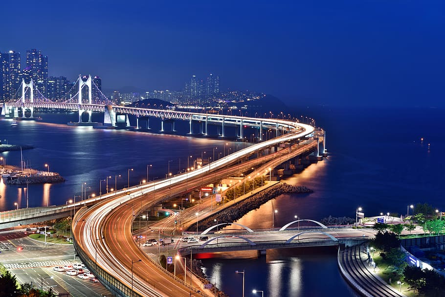 Gwangan Bridge at nights lighted up in Busan, South Korea, cityscape