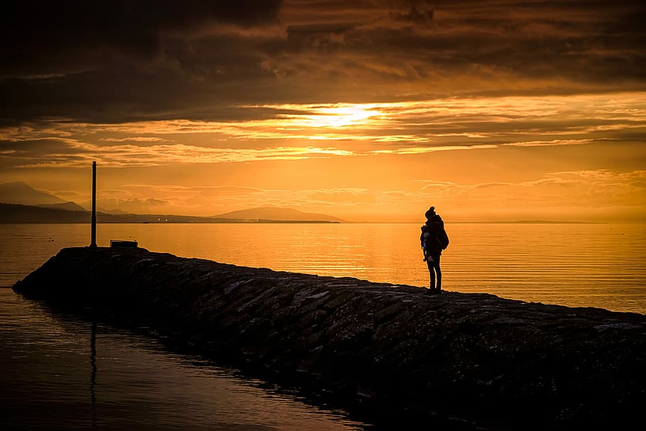 To the end of the world, man standing near water during golden hour, HD wallpaper